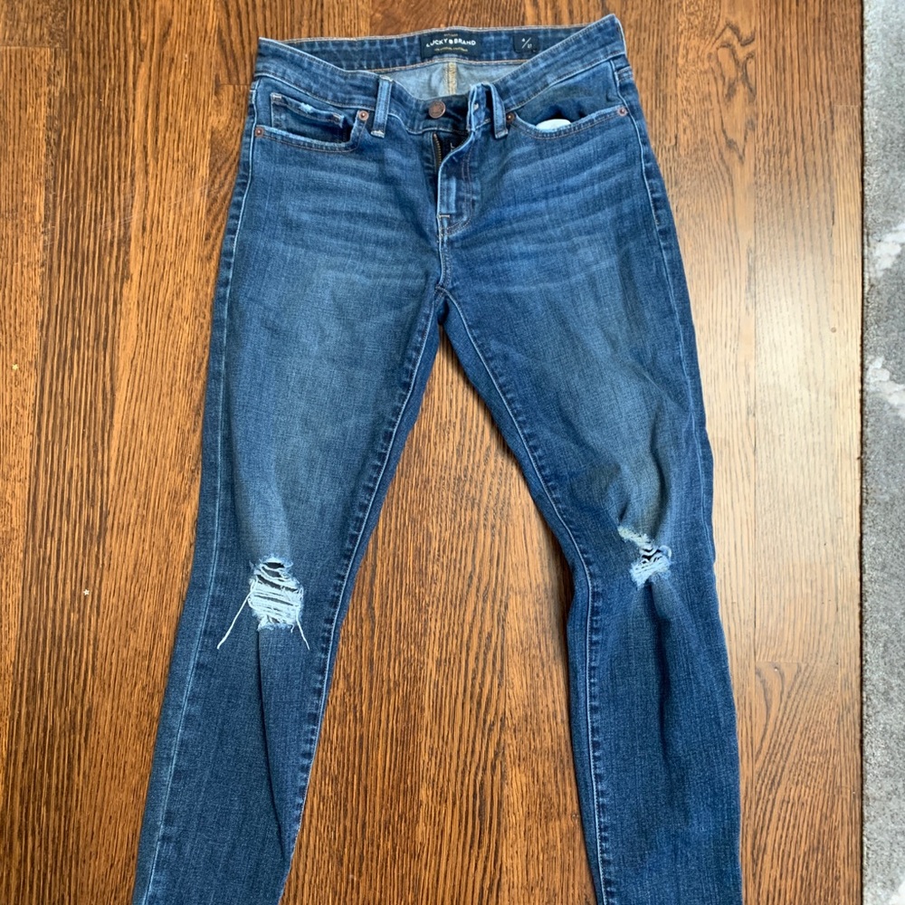 Blue Lucky jeans with ripped knees